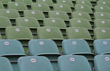 Rows of football stadium seats with numbers.