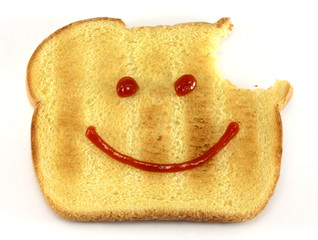 Bread with happy face and bite - Powered by Adobe