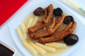 Roasted goose leg in red sauce