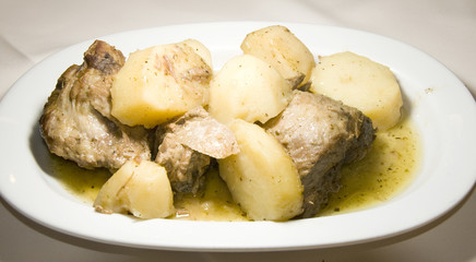 Greek food lamb lemon sauce with potatoes