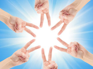 Hands of teamwork , forming the star shape