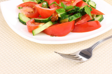 Fresh salad with tomatoes and cucumbers