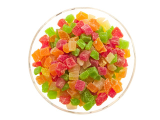 Candied fruits in a glass bowl.