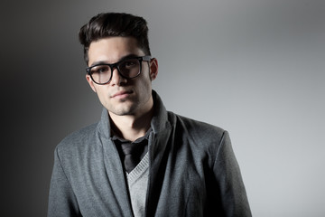 Fototapeta premium attractive man dressed casual wearing glasses - studio shot