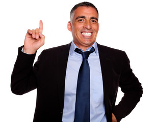 Hispanic senior businessman pointing up