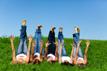 Women with towel on meadow