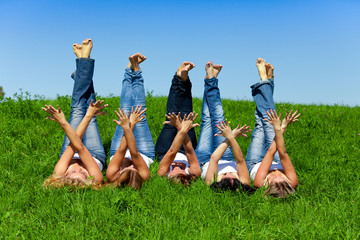 Women with towel on meadow