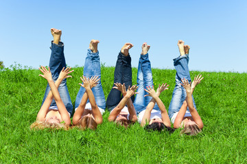 Women with towel on meadow