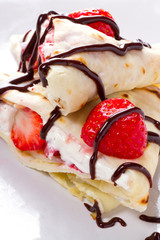 Delicious mascarpone cheese pancakes with fresh strawberries