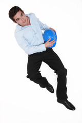 Young architect laying on the floor