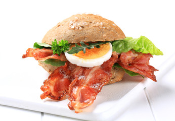 Bread bun with crispy bacon