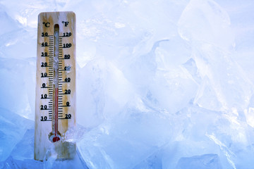 Thermometer and ice background global cooling concept - obrazy, fototapety, plakaty