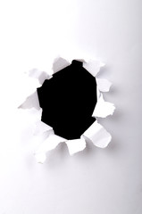 Hole in the white paper