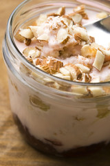 Sweet dessert in glass jar - strawberry cake