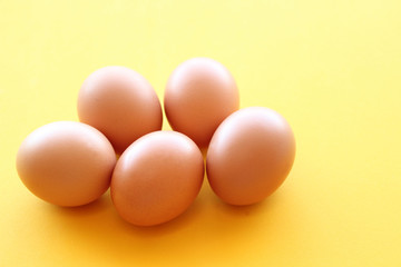 Five brown eggs