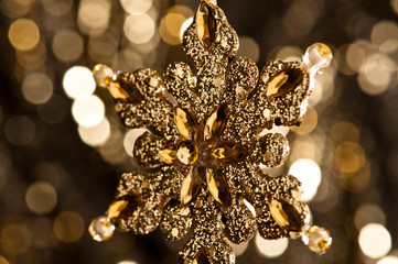 Artificial Snowflake in gold