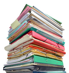 Stack of folders and old papers isolated