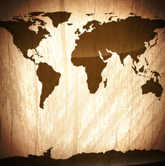 Vintage wooden background with world map