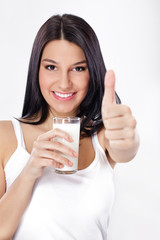 Smiling woman drinking healthy lifestyle milk food