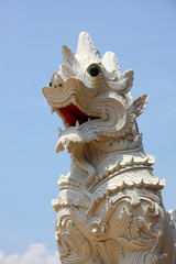 Fototapeta na wymiar White lion sculpture in Thai's temple