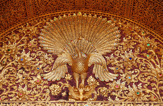 pattern of golden peacock sculpture