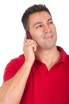 man standing and speaking at the phone