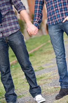 Gay Couple Outdise Holding Hands