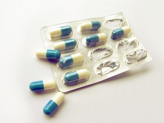white and blue capsules