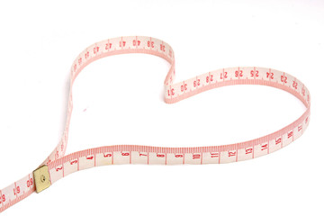 A measuring tape shaping a heart