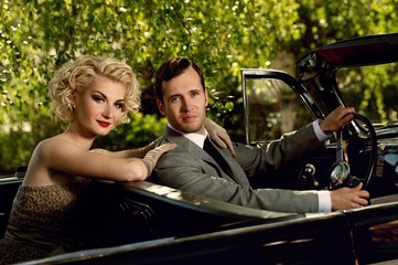 Retro couple in convertible
