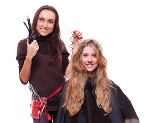 studio shot of hairdresser doing curly hair