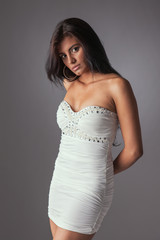 Fototapeta premium beautiful and sensual latin woman,in a white dress