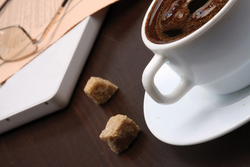 Having a cup of coffee