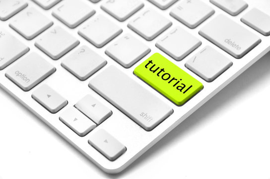 E-learning concept - keyboard with tutorial button