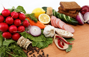 Healthy food. Fresh vegetables and fruits on a wooden table.