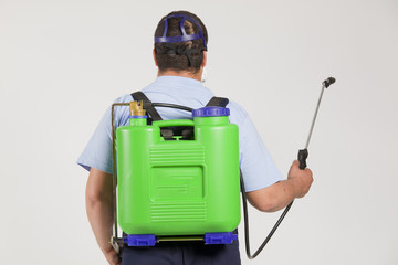 Man spraying insects- pest control