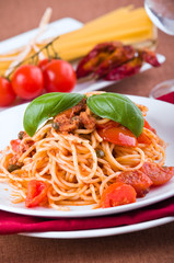 Spaghetti with tuna, cherry tomatoes and capers.