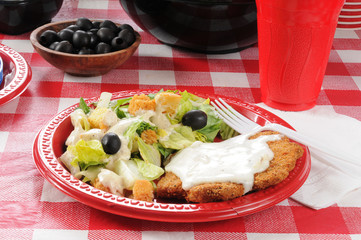 Breaded steak and salad