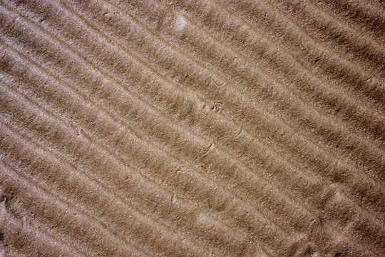 Dry sand surface with waves