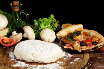delicious pizza dough, spices and vegetables