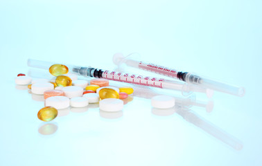 Insulin syringes with medical ampoules and tablets