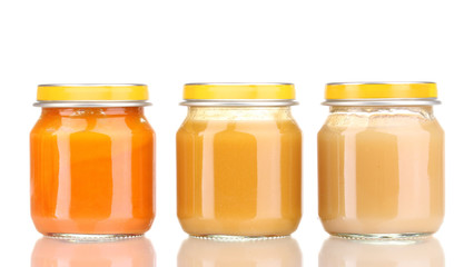 Jars of baby puree isolated on white