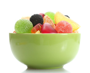 colorful jelly candies in green bowl isolated on white