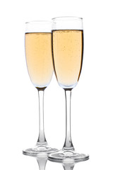 glasses of champagne isolated on a white