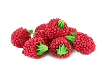 red candy raspberries isolated on white