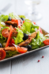 Closeup of chicken salad with black olives