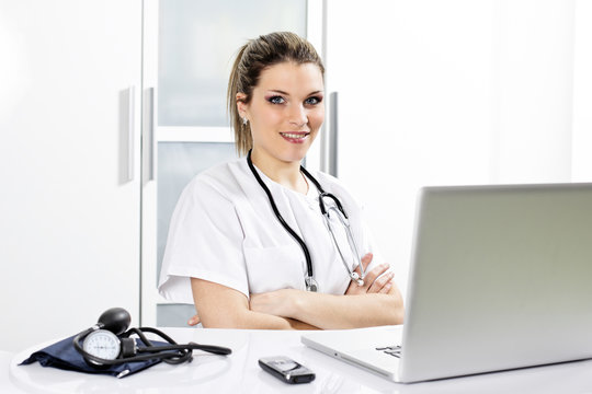 woman doctor with computer