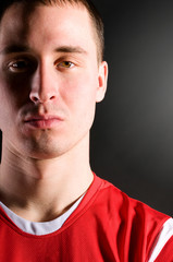 Fototapeta premium soccer player in dark