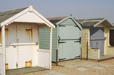 Fototapeta na wymiar Beach huts at Ferring. West Sussex. England
