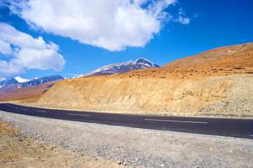 yellowish mountain road view in tibet of China